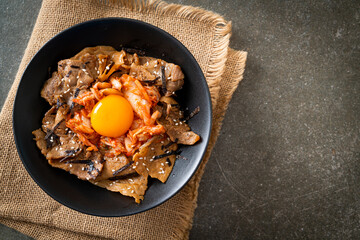 pork bulgogi rice bowl with kimchi and Korean pickled egg