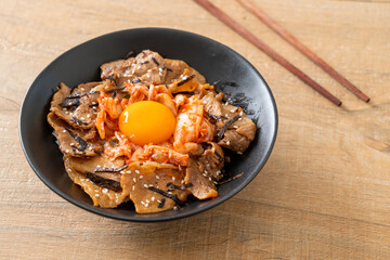 pork bulgogi rice bowl with kimchi and Korean pickled egg