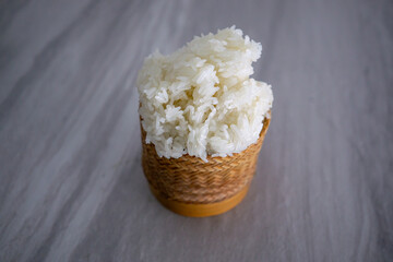Streamed sticky rice in wicker basket. It is Thai's favorite menu which is widely spread across the country, especially having it with spicy menu. It is inevitable.