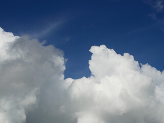 Cumulus cloud on beautiful blue sky in day light , Fluffy clouds formations at tropical zone