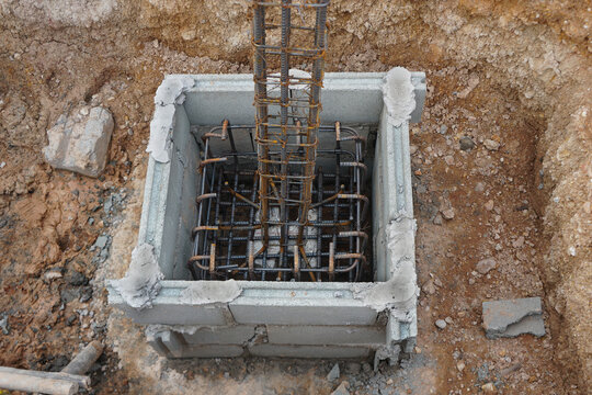steel reinforced concrete columns and footing in block concrete framework.