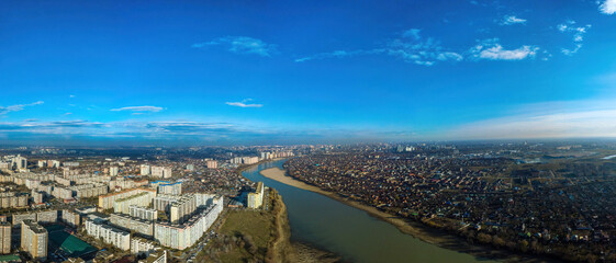aerial view of the shallowed Kuban river on a winter sunny day of a snowless southern winter of the city of Krasnodar - obrazy, fototapety, plakaty