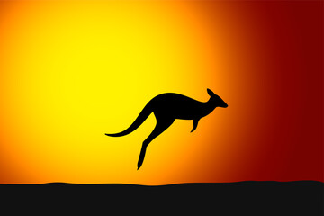 Fototapeta premium Kangaroo jumping front the sun, sunset, silhouette