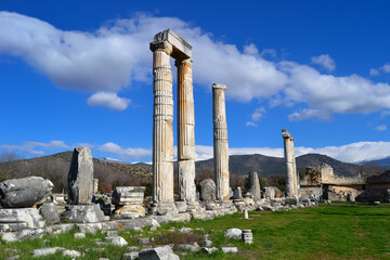 Ancient marble column ruins. Marble column view with blue sky view.