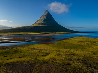 Fototapeta premium Beautiful aerial view of the Kirkjufell high mountain in Iceland, on the Snæfellsnes peninsula