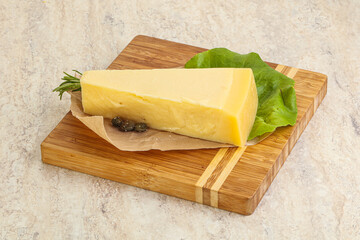Traditional delicous Parmesan cheese over borad