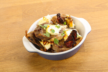 Baked pork tongue with cheese