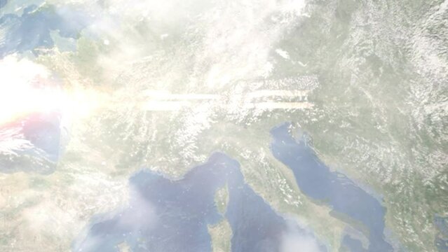 Earth zoom in from outer space to city. Zooming on Monza, Lombardy, Italy. The animation continues by zoom out through clouds and atmosphere into space. Images from NASA