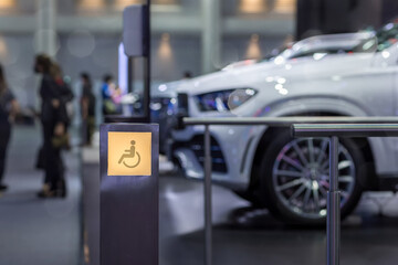 Lighting sign Disabled way.  Lighting signboard of handicap people way during the light is glowing. Wheelchair symbol on sign disabled sign for support wheelchair disabled people.