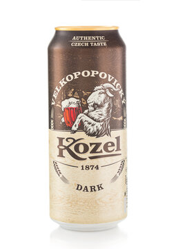 LONDON,UK - FEBRUARY 22,2022: Kozel Premium dark stout beer on white background.