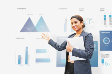 Energetic Indian woman presenting annual reports of the successful business company