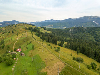 Green mountains of Ukrainian Carpathians in summer. Aerial drone view.