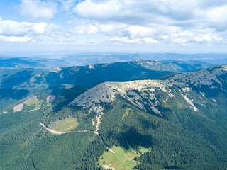 High mountains of the Ukrainian Carpathians in sunny weather. Aerial drone view.