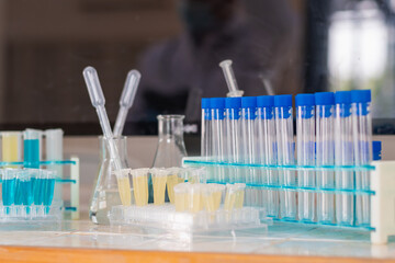 Numerous test tubes are used within epidemiological centers for research into the treatment of coronavirus. (COVID-19) that is spreading, causing many people to be infected.