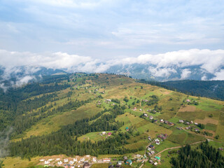 Fototapeta na wymiar High flight in the mountains of the Ukrainian Carpathians. Aerial drone view.