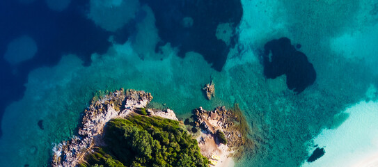 Coast as a background from top view. Turquoise water background from top view. Summer seascape from...