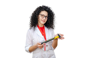 Young brunette woman in white robe holding hammer. Repair concept