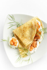 gourmet crepe pancake with sour cream tzatziki and smoked salmon