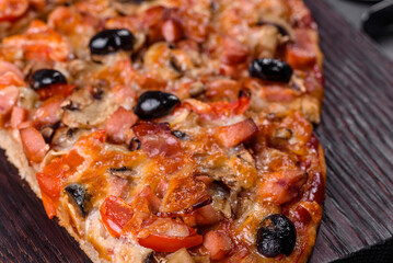 Homemade vegetable pizza with addition of tomatoes, olives and herbs