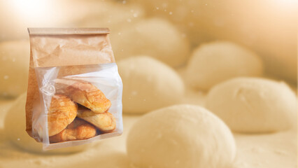 Pastry, Croissant, Bread, Bun in brown paper bag isolated on blurred background, Fresh bakery product in packaging, Fast food and Snack or Meal ready to eat, Sold in Convenience store or Supermarkets.