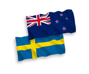 Flags of Sweden and New Zealand on a white background © epic
