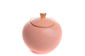 round stylish peach colored porcelain sugar bowl on white isolated background
