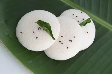 Foto op Canvas Idly , Idli is a traditional breakfast of South India served on banana leaf © SMD IMAGES
