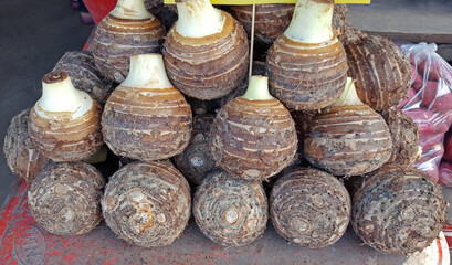 Fresh taro is sold at the market.