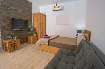 Modern bedroom area in a luxury studio apartment