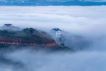 Morning landscape in a small town blurred in the morning mist is peaceful in the highlands of Da Lat, Vietnam