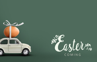 Retro car carrying an easter egg atop. Easter coming