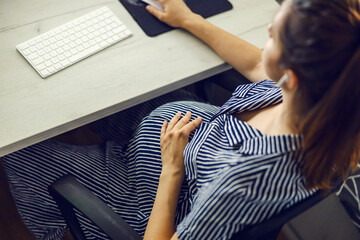 Pregnant woman and computer, home office and pregnant businesswoman.