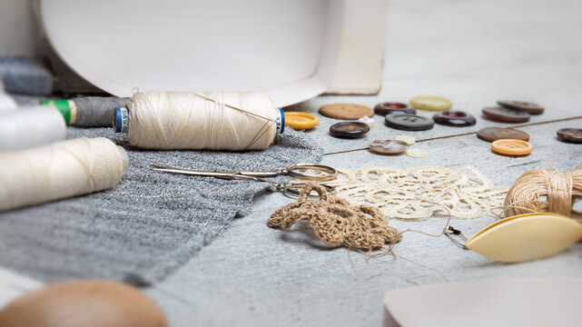 Sewing supplies on a wood table