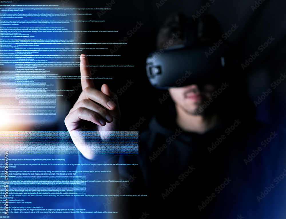 Poster only the latest tech will do. shot of a young computer programmer wearing a vr headset while working