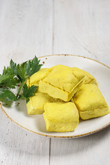 Tahu kuning or raw yellow tofu is one of type traditional food in indonesia