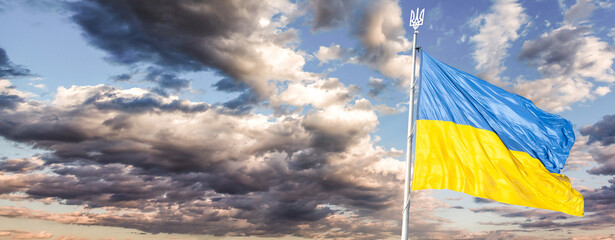 Ukraine flag isolated on the sky with clipping path. close up waving flag of Ukraine. flag symbols of Ukraine