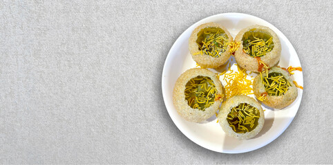 Indian panipuri dish, panipuri dish on table. © AA Studios