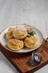 Kue Sus or Vanilla Soes Cakes (sus vla), A traditional French choux dough filled with custard.