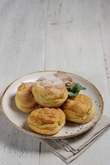 Kue Sus or Vanilla Soes Cakes (sus vla), A traditional French choux dough filled with custard.