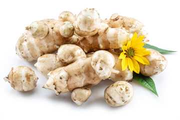 Jerusalem artichoke roots with leaves and flower of Jerusalem artichoke isolated on white background.