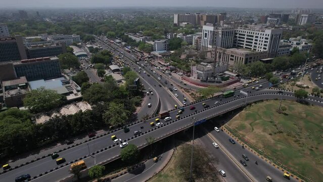 An aerial shot of the flyover with running traffic in New Delhi, India
