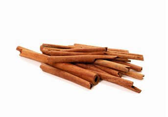 Bunch of cinnamon sticks isolated on white background.