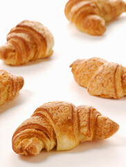 Fresh croissant and bakery background on kitchan ambient.