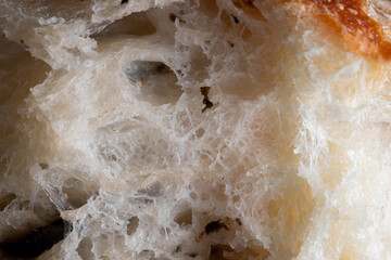 Super close up of the Olive French baguette bread cross section view