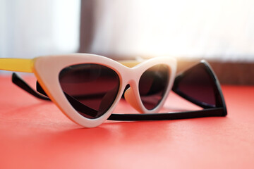 A pair of black and white glasses	