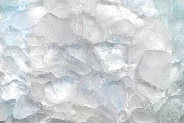 Abstract ice texture. Icy chunks on the surface. Top view close up. Fragments of crystals of irregular shape
