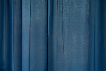 Brightly blue curtain texture background