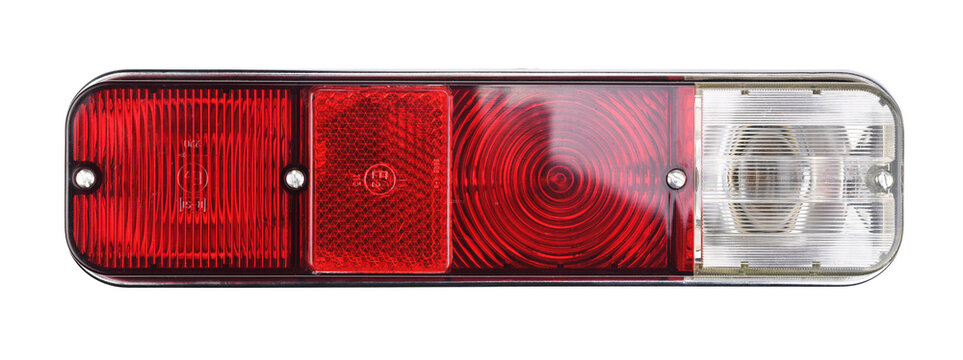 1960s and 1970s car headlight. Red stop or tail lights. Retro car headlight isolated on white background.