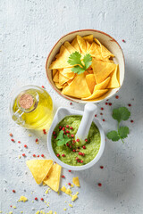 Fresh and delicious guacamole with tortilla, coriander and chilli peppers.