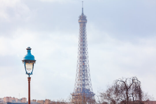 Eiffel Tower and street light . Paris famous symbol